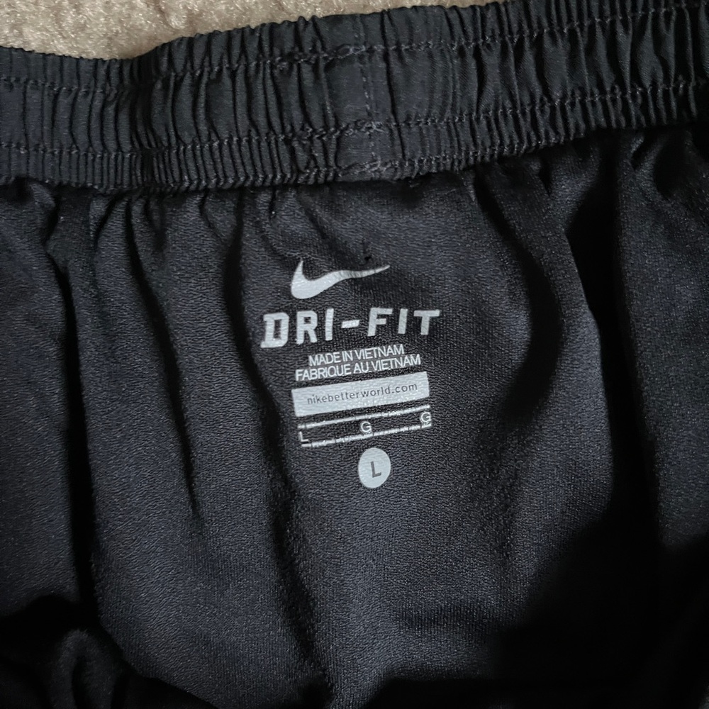 Black and pink Nike shorts